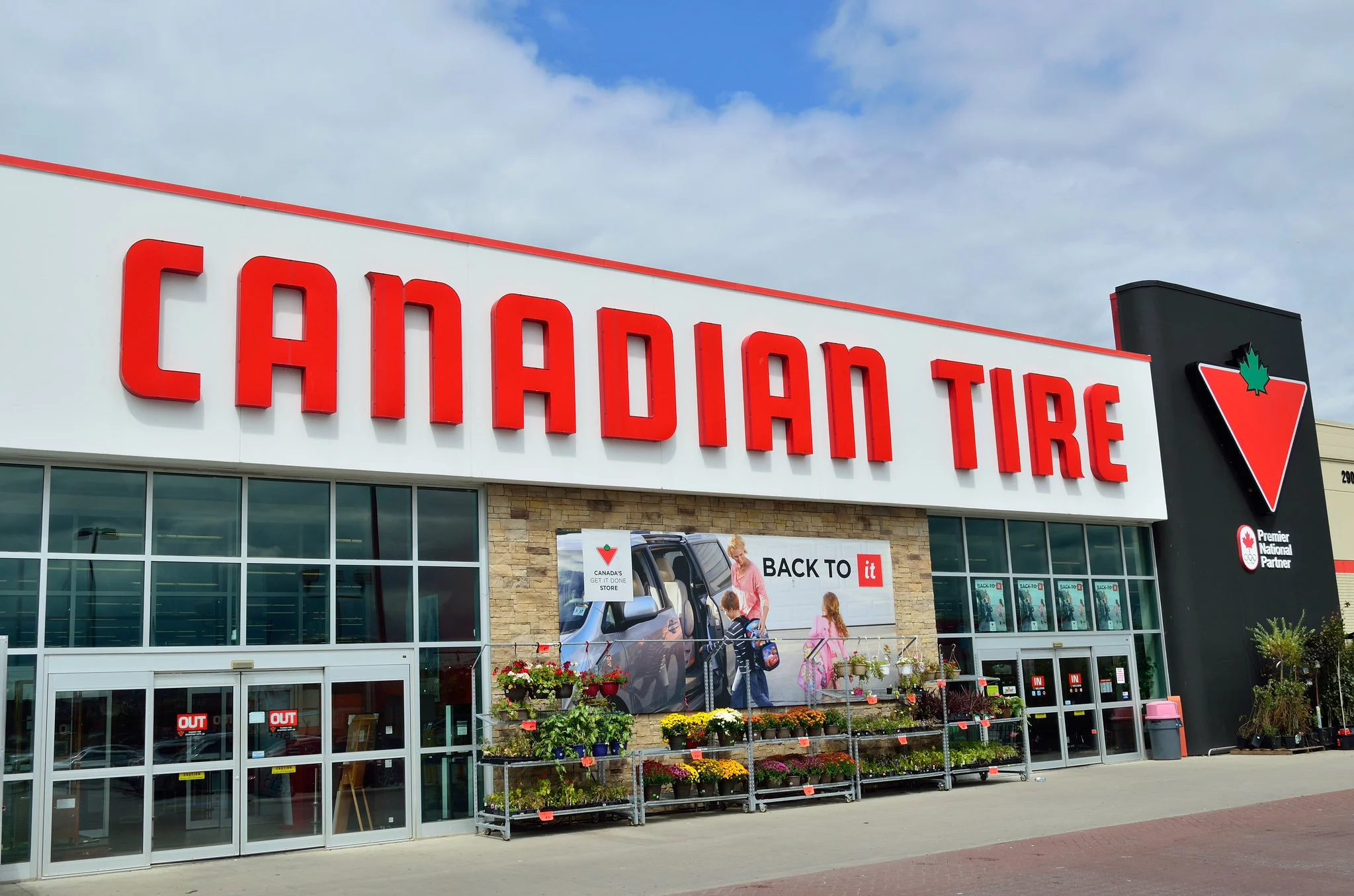 Who Did Canadian Tire Buy Out